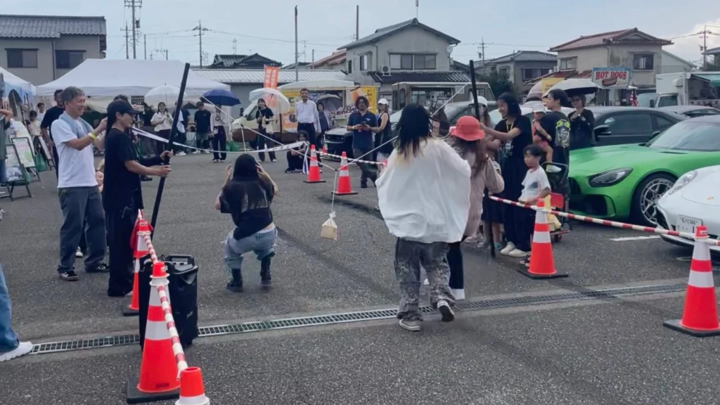 ABC MEETING 2026で開催されたパン食い競争を楽しむ来場者